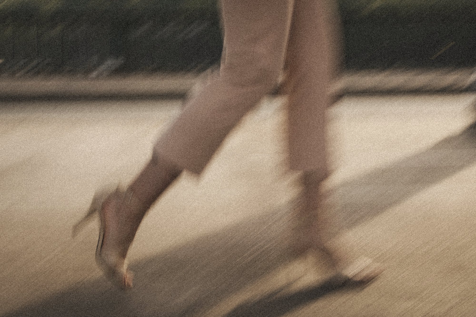 Aliya walking in heels, caught in motion